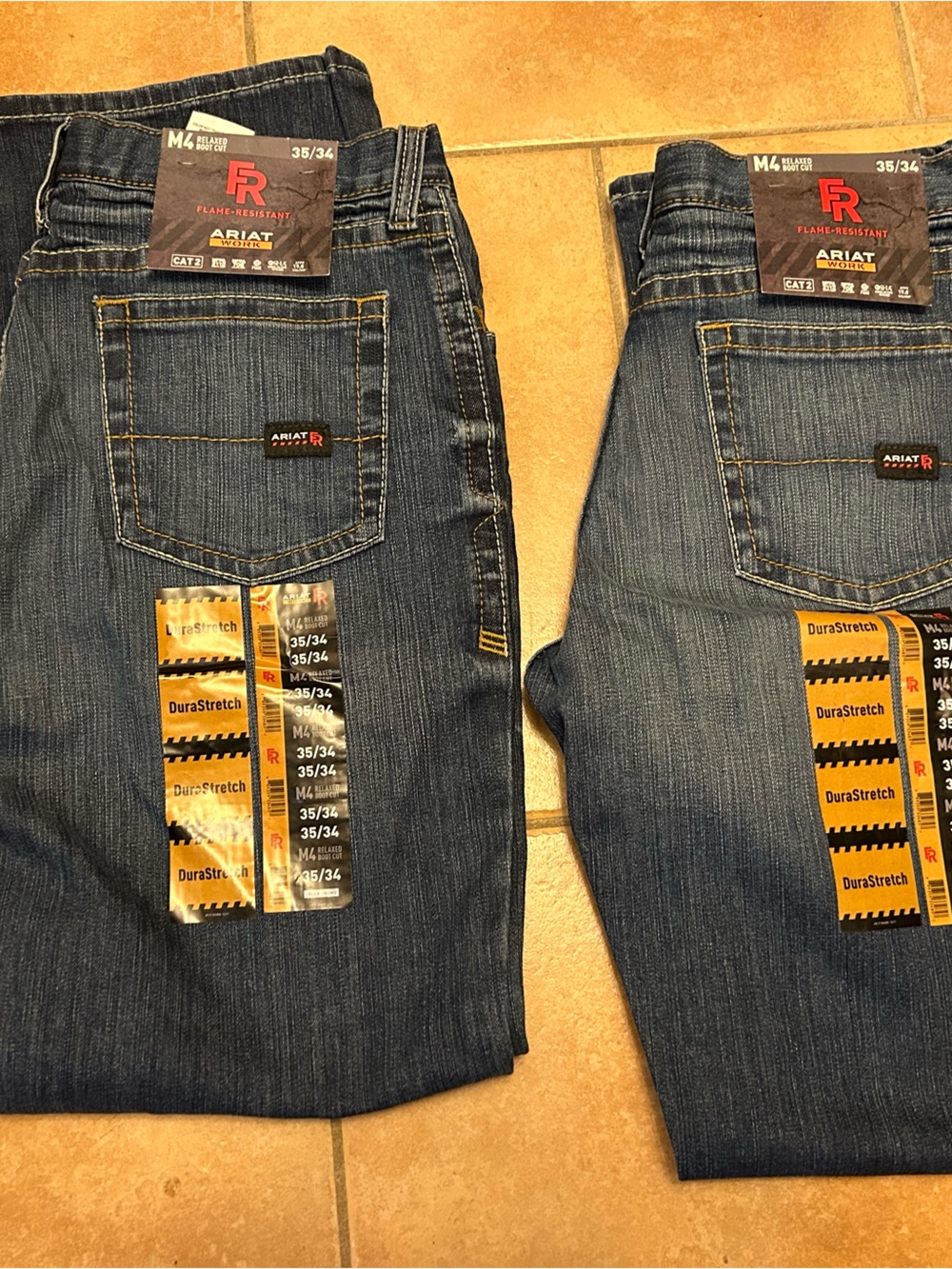 Lot of 2 new Ariat FR men 35x34 stretch flame resistant jeans